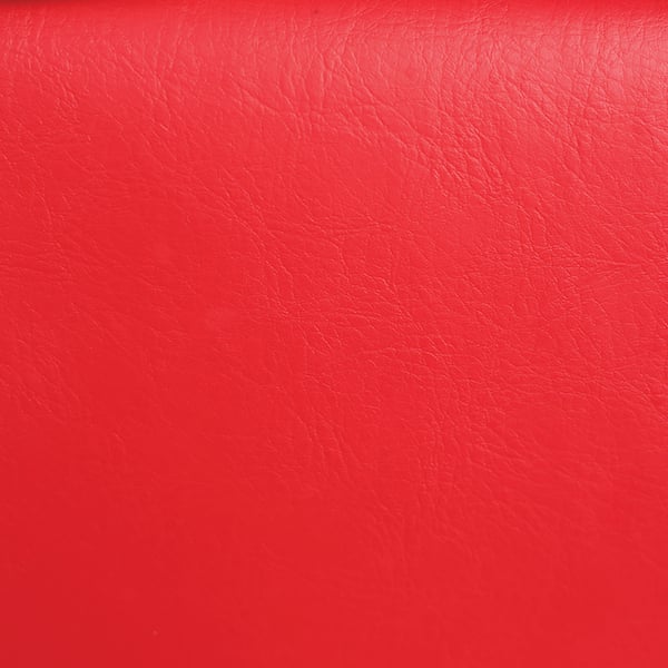Kaemark A close up of a red leather seat.
