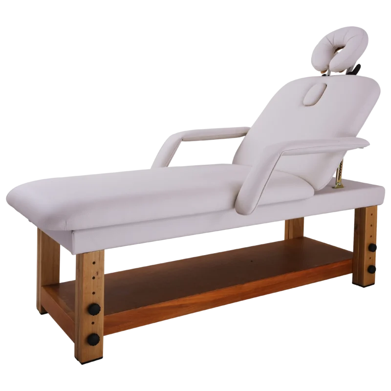 Kaemark A white Relax Treatment Table with wooden legs.