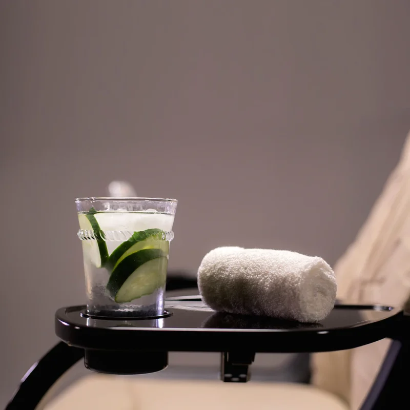 Kaemark A Le Rêve Pedicure Spa by Continuum Pedicure Spas with a drink and a towel on it.