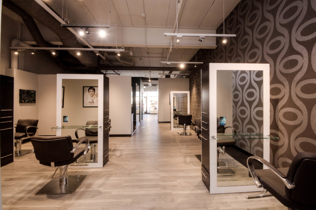 Kaemark An image of a hair salon with chairs and mirrors.