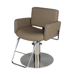 Kaemark A salon chair with a chrome base and a beige leather seat.