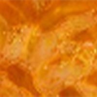 Kaemark A close up image of an orange liquid.