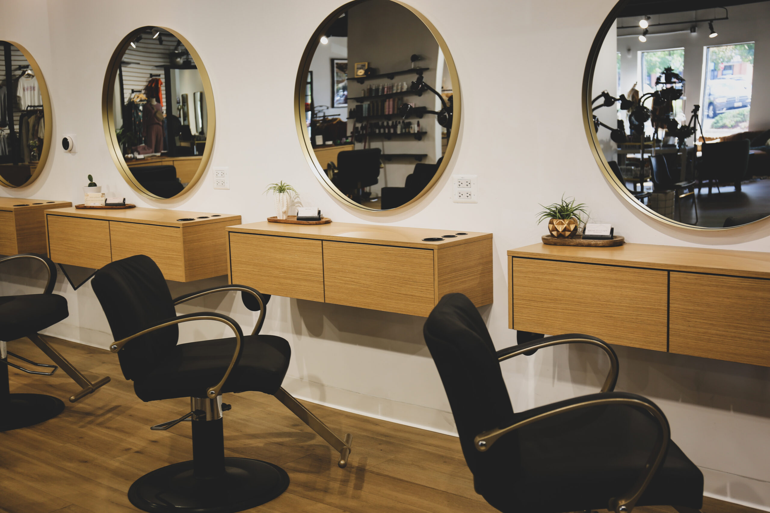Salon background showing styling chairs by Kaemark